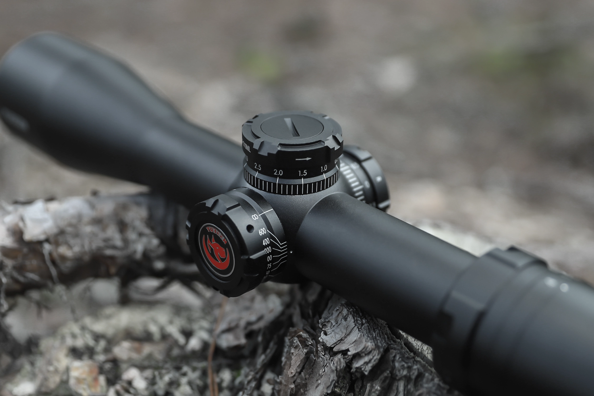 Close detail of the optical riflescope adjustment controls