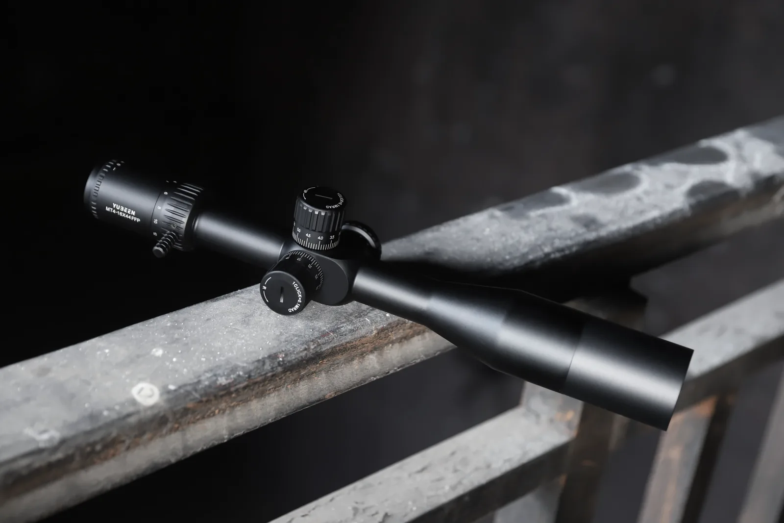 Yubeen MT4-16×44 SF FFP riflescope mounted in an outdoor field environment